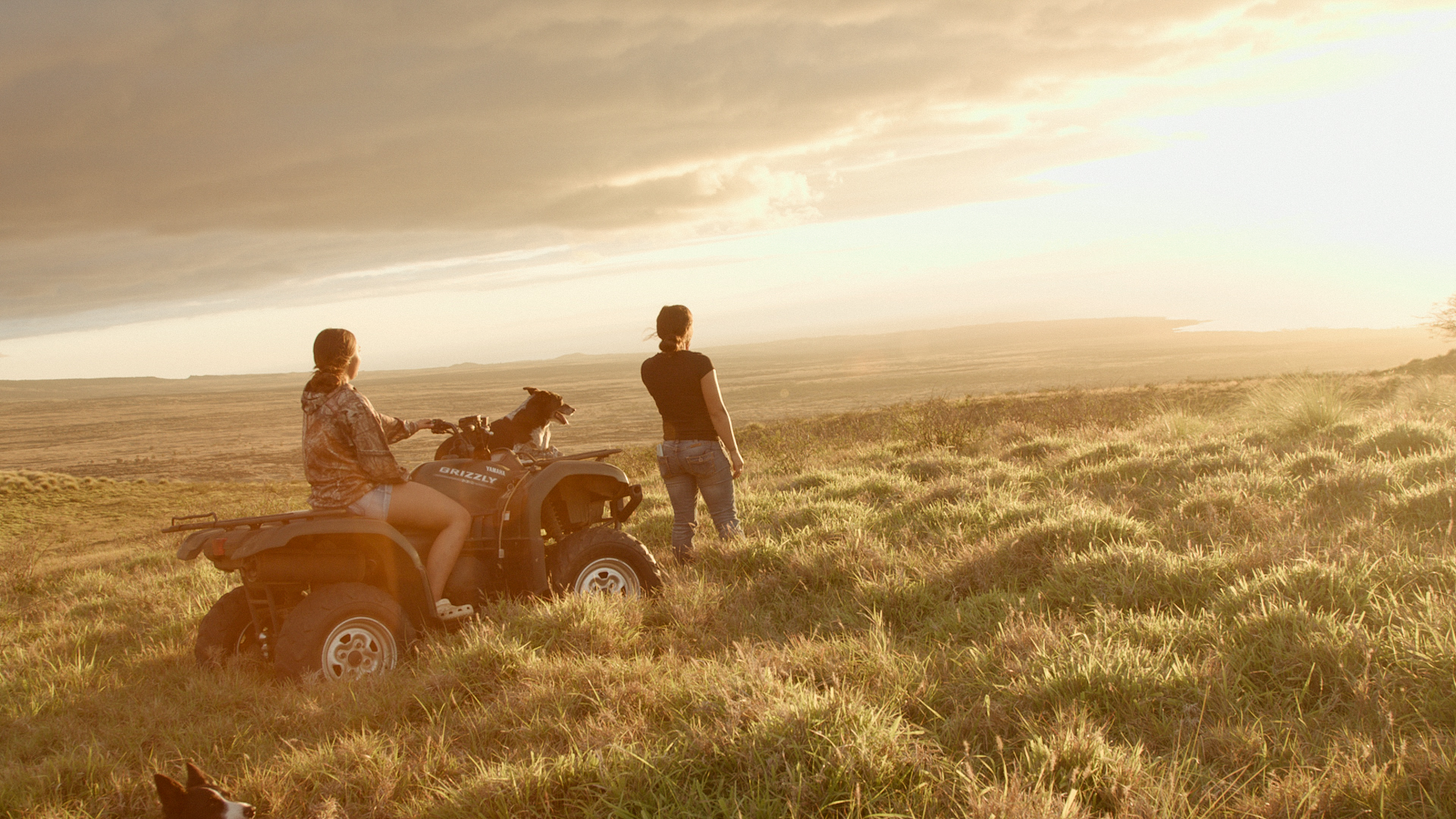 Laʻi Bertlemann & Nahe Tachera Keakealani overlooking the ranch